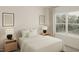 Serene main bedroom with two nightstands, neutral walls, and natural light at 108 N Stonemill Trl # Homesite 254, Wilson's Mills, NC 27520