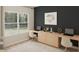 Bright office space with two desks, large windows, and modern decor perfect for productivity at 108 N Stonemill Trl # Homesite 254, Wilson's Mills, NC 27520