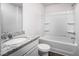 Bathroom with a white vanity with a granite countertop and a shower-tub combo at 110 Rhino Bnd, Oxford, NC 27565