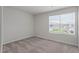 Cozy bedroom with neutral carpet and a window offering natural light at 110 Rhino Bnd, Oxford, NC 27565