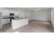 Open kitchen layout with stainless appliances, granite counters, and a kitchen island, perfect for modern living at 110 Rhino Bnd, Oxford, NC 27565