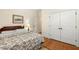 Cozy bedroom with hardwood flooring and generous closet space for storage at 1115 Wake Forest Rd # B, Raleigh, NC 27604