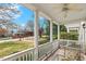 Comfortable covered porch featuring a ceiling fan and views of the street at 1115 Wake Forest Rd # B, Raleigh, NC 27604