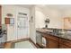 The kitchen features granite countertops, stainless steel appliances, and wooden cabinets at 1115 Wake Forest Rd # B, Raleigh, NC 27604