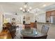 Spacious and open living area with hardwood floors, a fireplace, and access to the kitchen at 1115 Wake Forest Rd # B, Raleigh, NC 27604