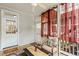 Relaxing screened porch with ceiling fan, comfortable seating and exterior access at 1115 Wake Forest Rd # B, Raleigh, NC 27604