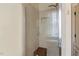 Modern glass-enclosed shower with tile surround and convenient built-in shelving at 1115 Wake Forest Rd # B, Raleigh, NC 27604