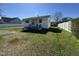 Charming single-story home with a well-maintained lawn and white picket fence at 113 Smith St, Four Oaks, NC 27524