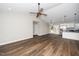 The open floor plan connects the living area and kitchen, complemented by stylish flooring at 120 W College St, Oxford, NC 27565