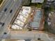 Aerial view of a townhouse construction site showing building progress at 1310 Chamblee Hill Ct, Raleigh, NC 27608