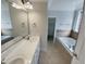 Bright bathroom features double sinks, a soaking tub, and tile accents at 138 Parkdale Ln, Clayton, NC 27520