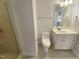 Well-lit bathroom with tiled floors features modern fixtures and a functional design for everyday use at 138 Parkdale Ln, Clayton, NC 27520
