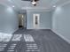 Spacious bedroom with ample closet space and access to additional rooms at 138 Parkdale Ln, Clayton, NC 27520