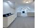 Large bonus room featuring a wet bar, carpeted floors and a fireplace at 138 Parkdale Ln, Clayton, NC 27520