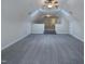 Spacious bonus room with vaulted ceilings, skylights and neutral carpeting provides flexible living space at 138 Parkdale Ln, Clayton, NC 27520