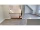 Second floor hallway with wood and wrought iron railing overlooking common living spaces at 138 Parkdale Ln, Clayton, NC 27520