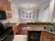 Well-equipped kitchen with granite countertops, stainless steel appliances, and a breakfast nook at 138 Parkdale Ln, Clayton, NC 27520