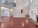 Open concept living room with archways and hardwood floors provides ample space for living and entertaining at 138 Parkdale Ln, Clayton, NC 27520