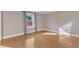 A bedroom with nice wood floors and a window for natural light at 152 E Tryon St, Hillsborough, NC 27278