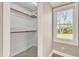 Open closet includes shelving for storage and view out the window at 152 E Tryon St, Hillsborough, NC 27278