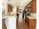 Spacious kitchen featuring stainless steel appliances, and hardwood floors at 1756 Main Divide Dr, Wake Forest, NC 27587
