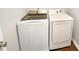 Modern laundry room with newer Samsung washer and dryer units at 1756 Main Divide Dr, Wake Forest, NC 27587