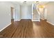 The living room offers an open floor plan with hardwood floors and staircase access at 1756 Main Divide Dr, Wake Forest, NC 27587