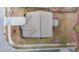 Aerial view showcasing the home's roof, driveway, and landscaping surrounded by greenery at 1800 Bodwin Ln, Apex, NC 27502