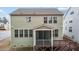 Back exterior featuring a screened in porch and wooden deck at 1800 Bodwin Ln, Apex, NC 27502