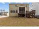 Expansive backyard featuring a screened in porch and deck at 1800 Bodwin Ln, Apex, NC 27502