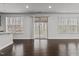Dining area that features hardwood floors, ample windows and a sliding door leading to the deck at 1800 Bodwin Ln, Apex, NC 27502