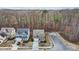 Exterior shot of the home and surrounding landscape in a residential neighborhood at 1800 Bodwin Ln, Apex, NC 27502