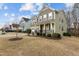 A two story house with a covered porch and a two car garage at 1800 Bodwin Ln, Apex, NC 27502