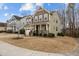 Charming exterior elevation of a two-story home, landscaped yard at 1800 Bodwin Ln, Apex, NC 27502