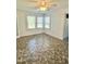Bright bedroom showcasing a ceiling fan, and ample natural light at 201 Colonial Ave, Goldston, NC 27252