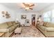 Comfortable living room with an inviting seating arrangement and a decorative rug at 201 Colonial Ave, Goldston, NC 27252