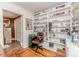 Office space featuring built-in shelving and a comfortable office chair at 201 Colonial Ave, Goldston, NC 27252