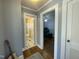 Hallway view looking into the bathroom and the bedroom at 214 Grace St, Oxford, NC 27565