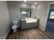 Bathroom with a granite vanity, toilet, and modern fixtures at 22 Wynd Crest Way, Benson, NC 27504
