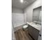 Bathroom with a tub, a shower, a toilet, and a vanity with granite countertop at 22 Wynd Crest Way, Benson, NC 27504