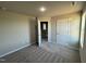 Empty bedroom with carpet and neutral paint at 22 Wynd Crest Way, Benson, NC 27504