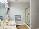 Functional bathroom featuring a double sink vanity and a glass-enclosed shower at 254 Pedernales Dr, Smithfield, NC 27577