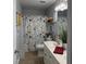 Bathroom with a white vanity, floral shower curtain, and decorative accents at 254 Pedernales Dr, Smithfield, NC 27577