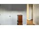 This bedroom features a storage cabinet with adjacent closets and neutral paint at 254 Pedernales Dr, Smithfield, NC 27577