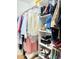 Organized closet space with hanging clothes, shelves for shoes, and additional storage solutions at 254 Pedernales Dr, Smithfield, NC 27577