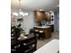 Dining area with wood cabinets and a view to the kitchen area at 254 Pedernales Dr, Smithfield, NC 27577