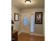 Welcoming entryway with decorative front door and neutral paint at 254 Pedernales Dr, Smithfield, NC 27577