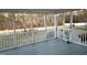 View from screened porch showing a backyard with trees in the distance, offering outdoor living space at 254 Pedernales Dr, Smithfield, NC 27577