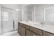 Bright bathroom with double vanity and glass shower at 256 Chesapeake Commons St # 157, Garner, NC 27529