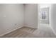 Bedroom features neutral carpet and a window at 256 Chesapeake Commons St # 157, Garner, NC 27529
